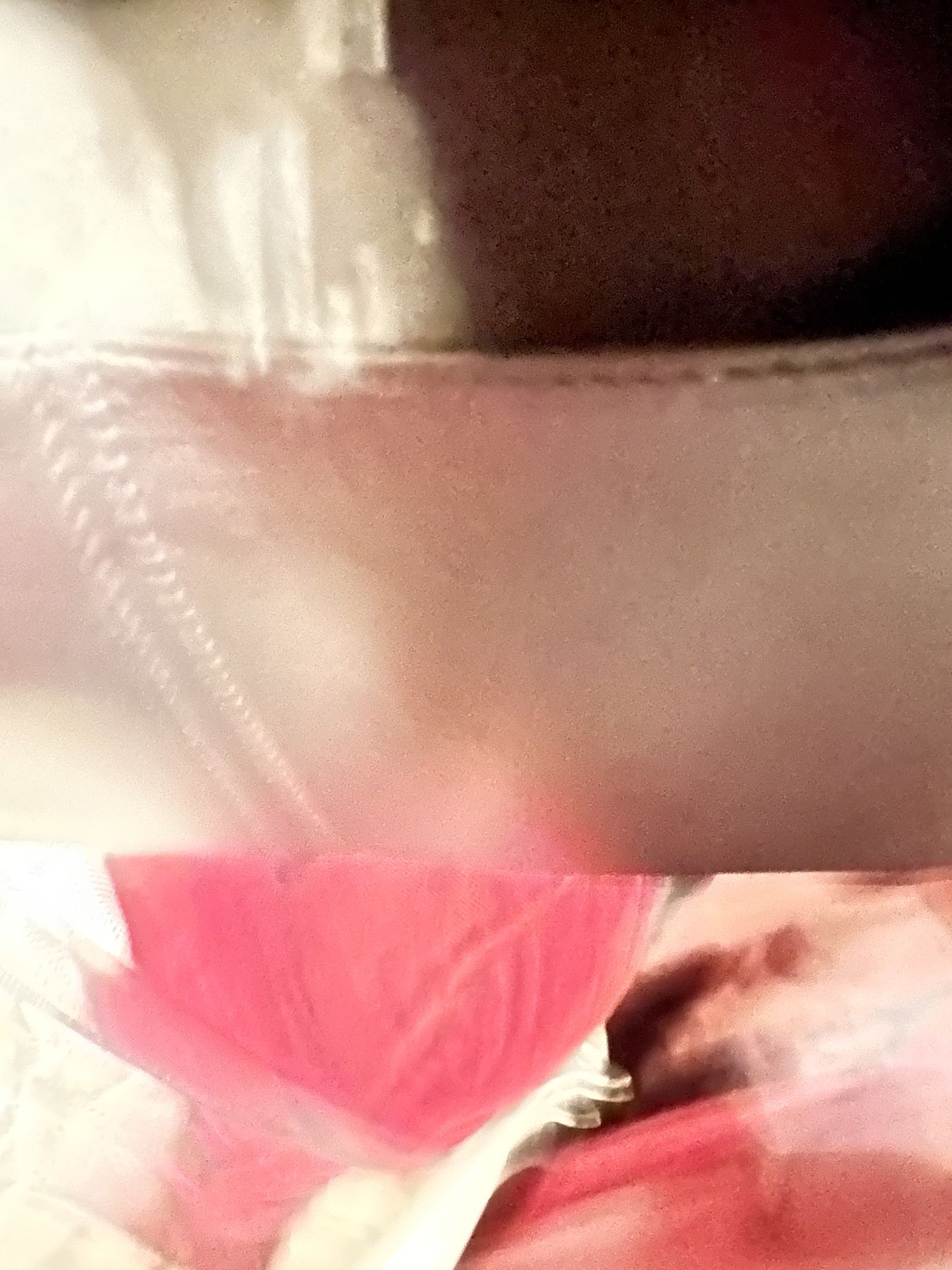 Abstract photograph in soft pink and grey tones